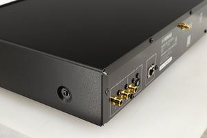 Rear right corner of a used Yamaha NP-S303 Musicast Streamer in a black finish