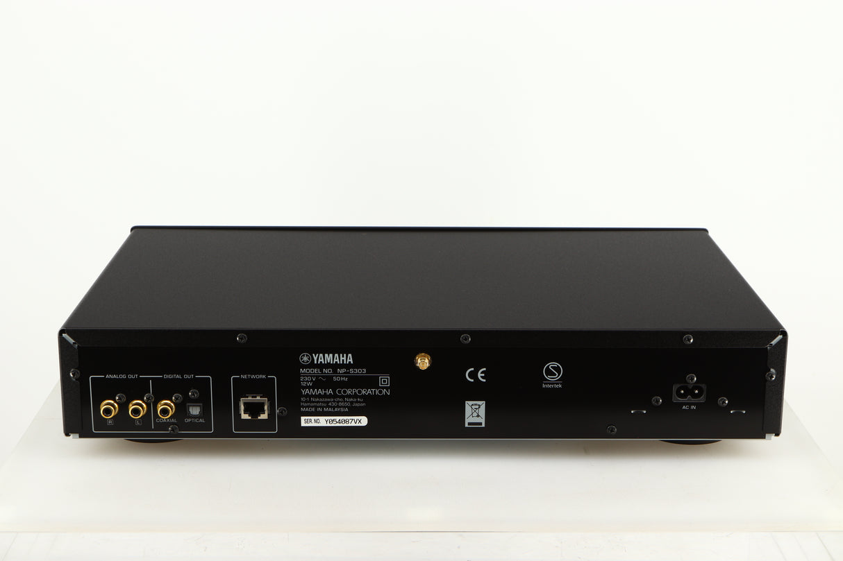 Rear view of a used Yamaha NP-S303 Musicast Streamer in a black finish showing Phono Outputs, Power Input, Network Input and Optical Output