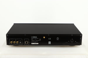 Rear view of a used Yamaha NP-S303 Musicast Streamer in a black finish showing Phono Outputs, Power Input, Network Input and Optical Output