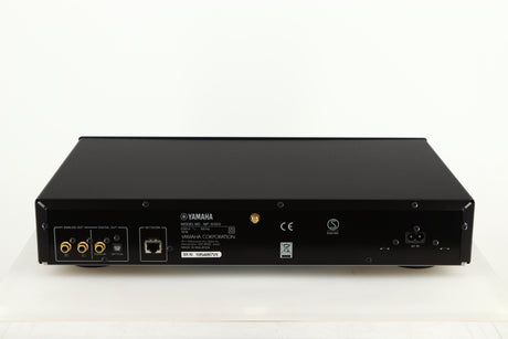 Rear view of a used Yamaha NP-S303 Musicast Streamer in a black finish showing Phono Outputs, Power Input, Network Input and Optical Output