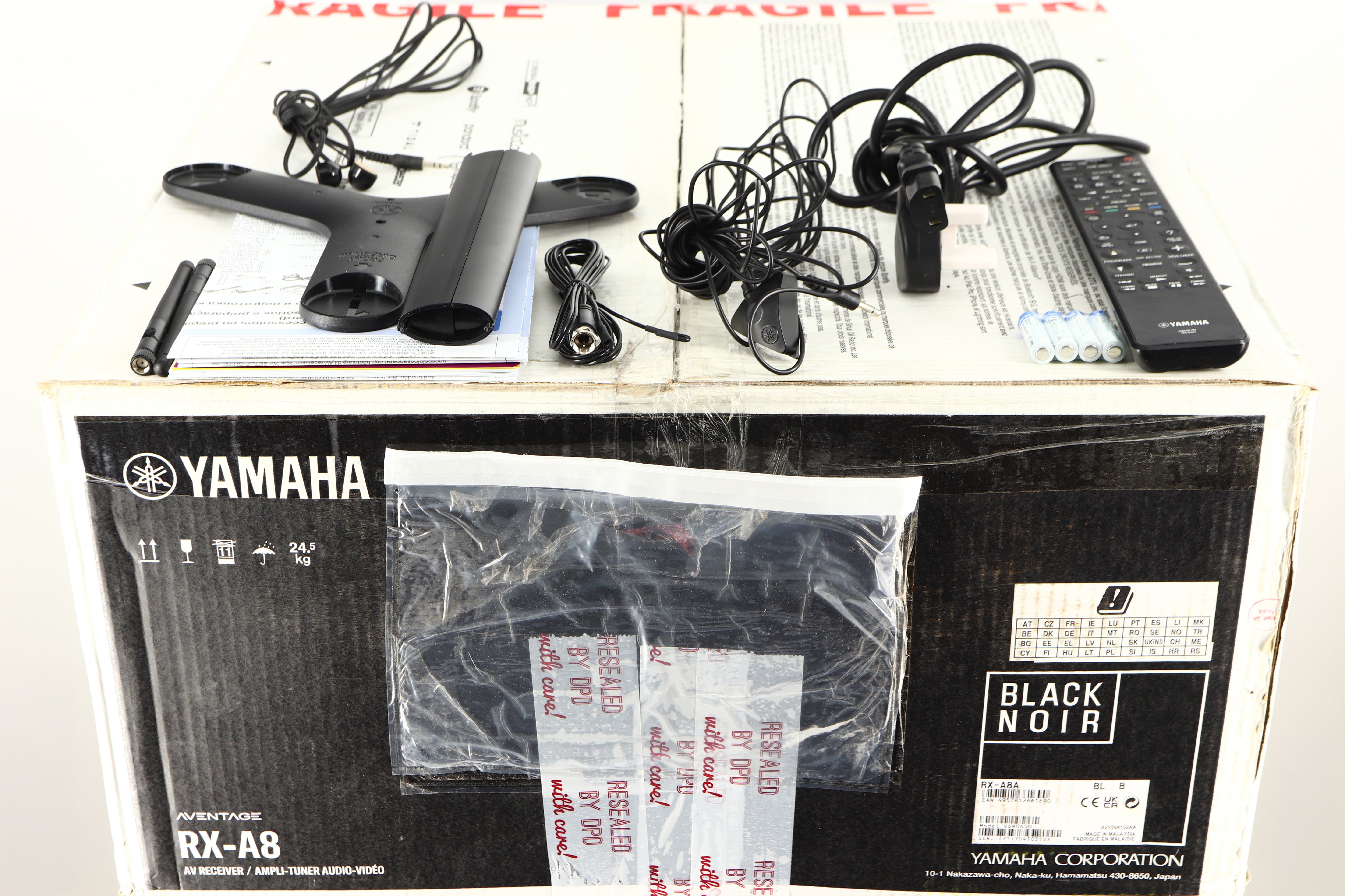 Box for a used Yamaha RX-A8A Aventage AV Receiver in a black finish showing Manual, Remote, Batteries, Mains Cable, Microphone, Microphone Stand, Bluetooth Antenna, Wi-Fi Antenna and Coaxial Cable