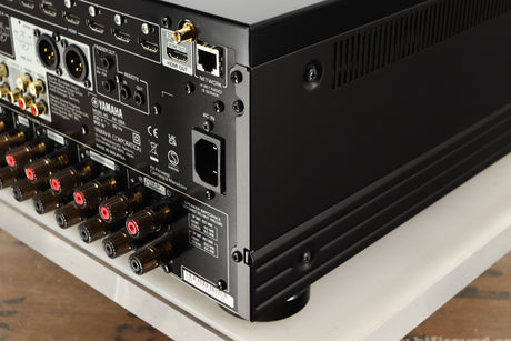 Rear left corner of a used Yamaha RX-A8A Aventage AV Receiver in a black finish