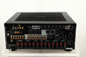 Rear view of a used Yamaha RX-A8A Aventage AV Receiver in a black finish showing Phono Inputs, Phono Outputs, Mains Input, HDMI Inputs, HDMI Outputs, Optical Outputs, Optical Inputs, Network Input and Speaker Outputs