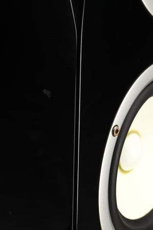 Close up of a used Yamaha Soavo 1 Floorstanding Speaker in a piano black finish showing chip on left side