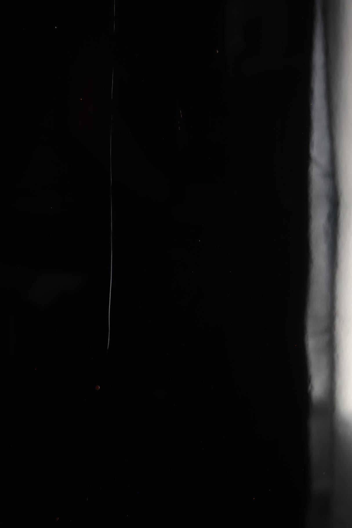 Close up of a used Yamaha Soavo 1 Floorstanding Speaker in a piano black finish showing scratch on rear
