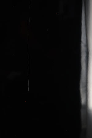 Close up of a used Yamaha Soavo 1 Floorstanding Speaker in a piano black finish showing scratch on rear
