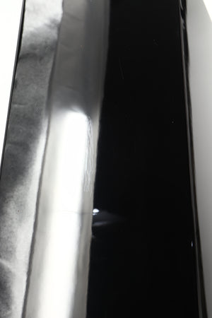Close up of a used Yamaha Soavo 1 Floorstanding Speaker in a piano black finish showing scratching on rear