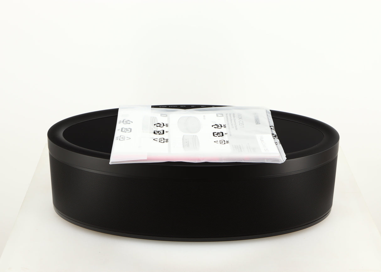 Top of a used Yamaha WX-051 Musicast Streaming Speaker in a black finish showing Manual