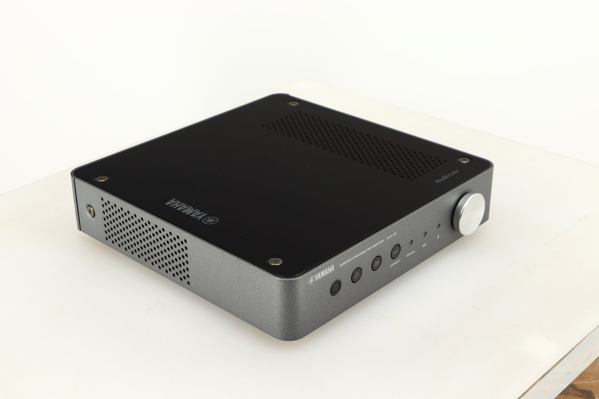 Front left corner of a used Yamaha WXC-50 Streaming Pre Amplifier in a silver finish