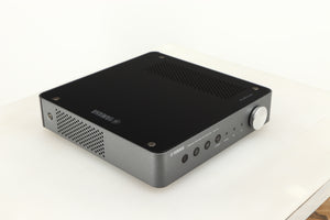 Front left corner of a used Yamaha WXC-50 Streaming Pre Amplifier in a silver finish