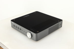 Front right corner of a used Yamaha WXC-50 Streaming Pre Amplifier in a silver finish