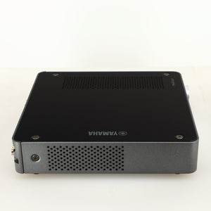 Left side view of a used Yamaha WXC-50 Streaming Pre Amplifier in a silver finish