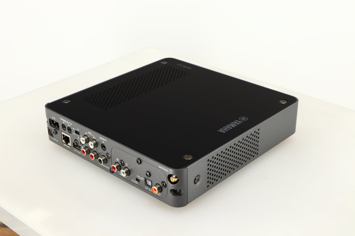 Rear left corner of a used Yamaha WXC-50 Streaming Pre Amplifier in a silver finish