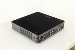 Rear right corner of a used Yamaha WXC-50 Streaming Pre Amplifier in a silver finish