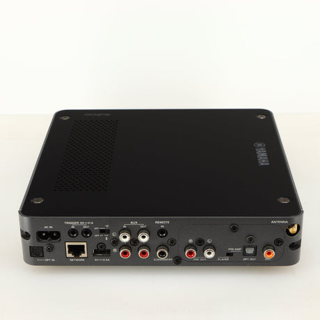 Rear view of a used Yamaha WXC-50 Streaming Pre Amplifier in a silver finish showing Phono Inputs, Phono Outputs, Network Input, Optical Output, Optical Input, USB Input and Power Input