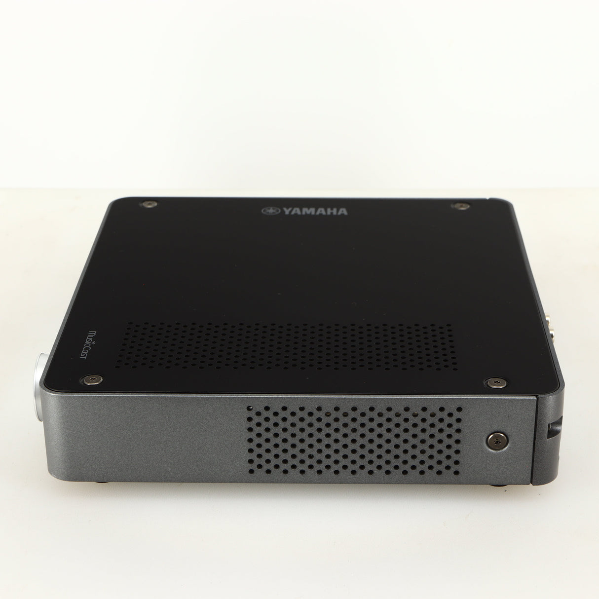 Right side view of a used Yamaha WXC-50 Streaming Pre Amplifier in a silver finish