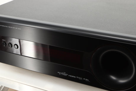 Close up view of a used Yamaha SR-300 Integrated Receiver in a black finish showing scratching on screen